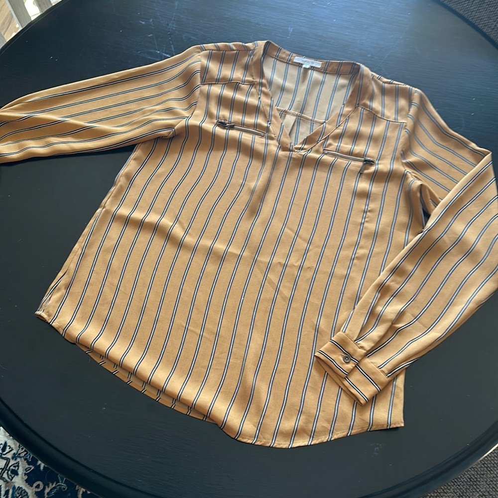 100% Polyester size small blouse